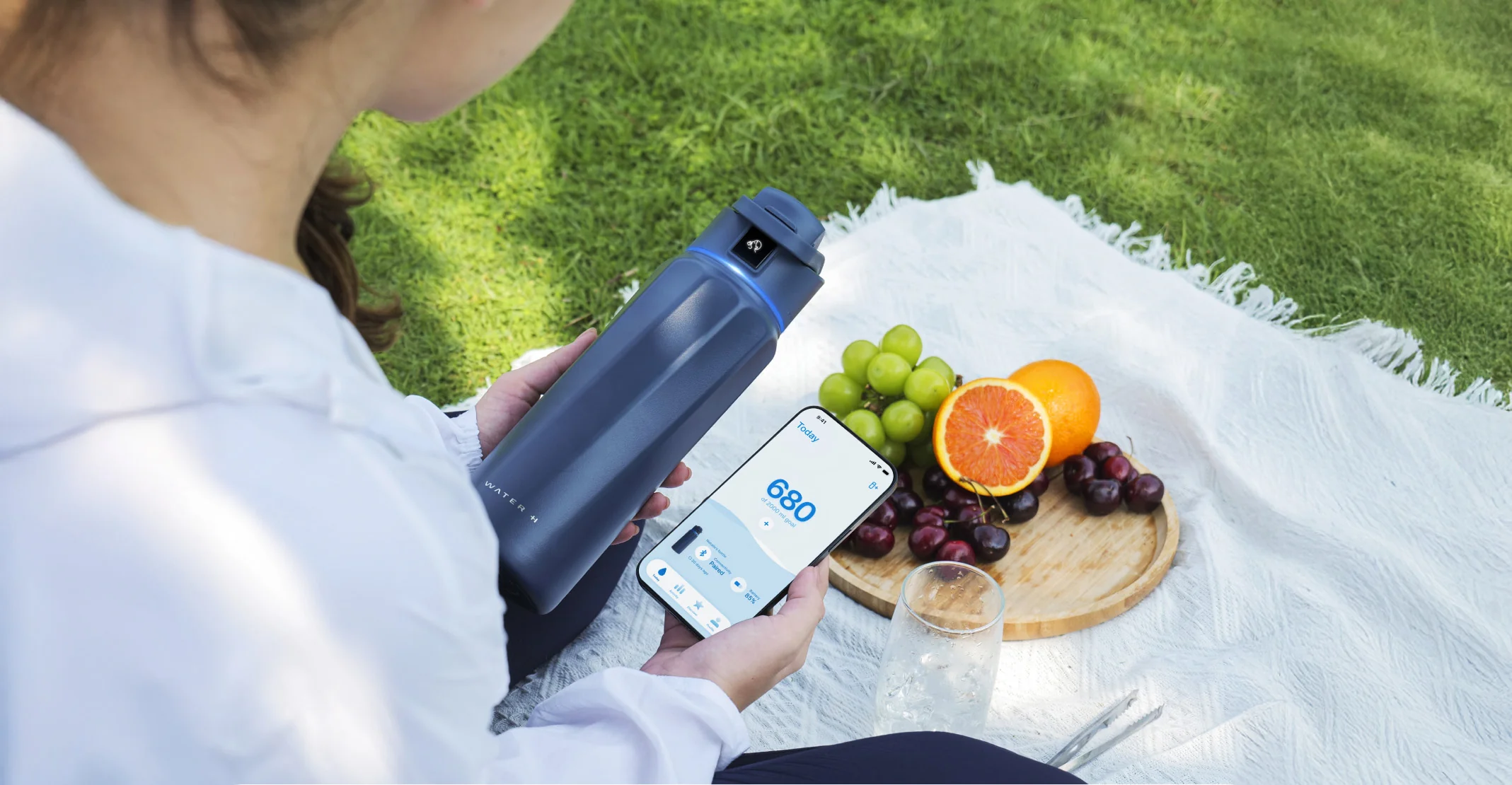 WaterH smart bottle with companion mobile app showing hydration tracking